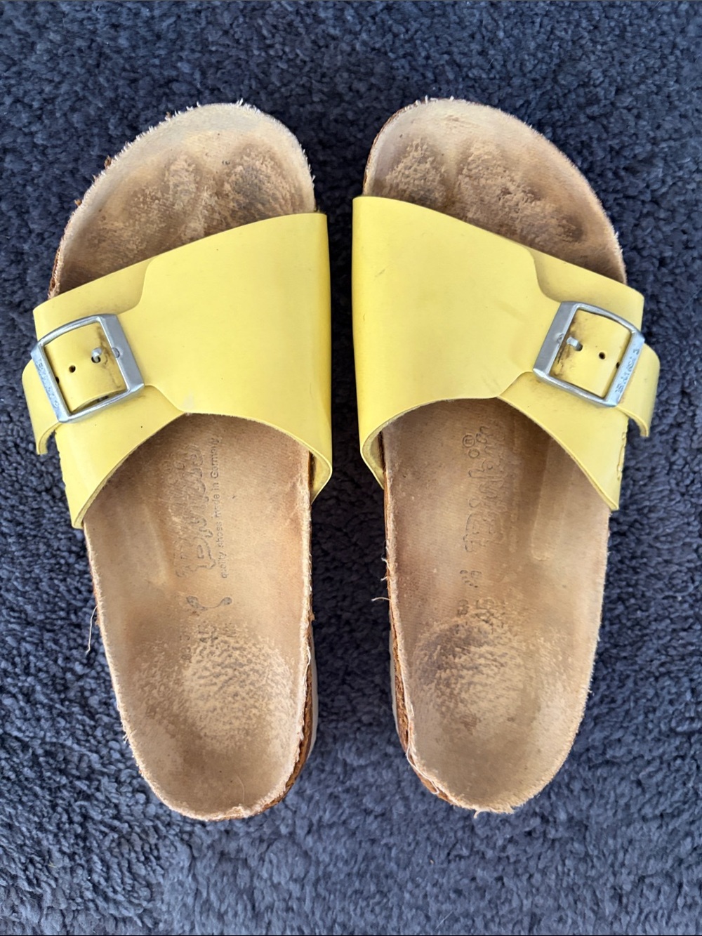 Birkenstock Women’s Yellow Patent Single Strap Slide with Silver Buckle